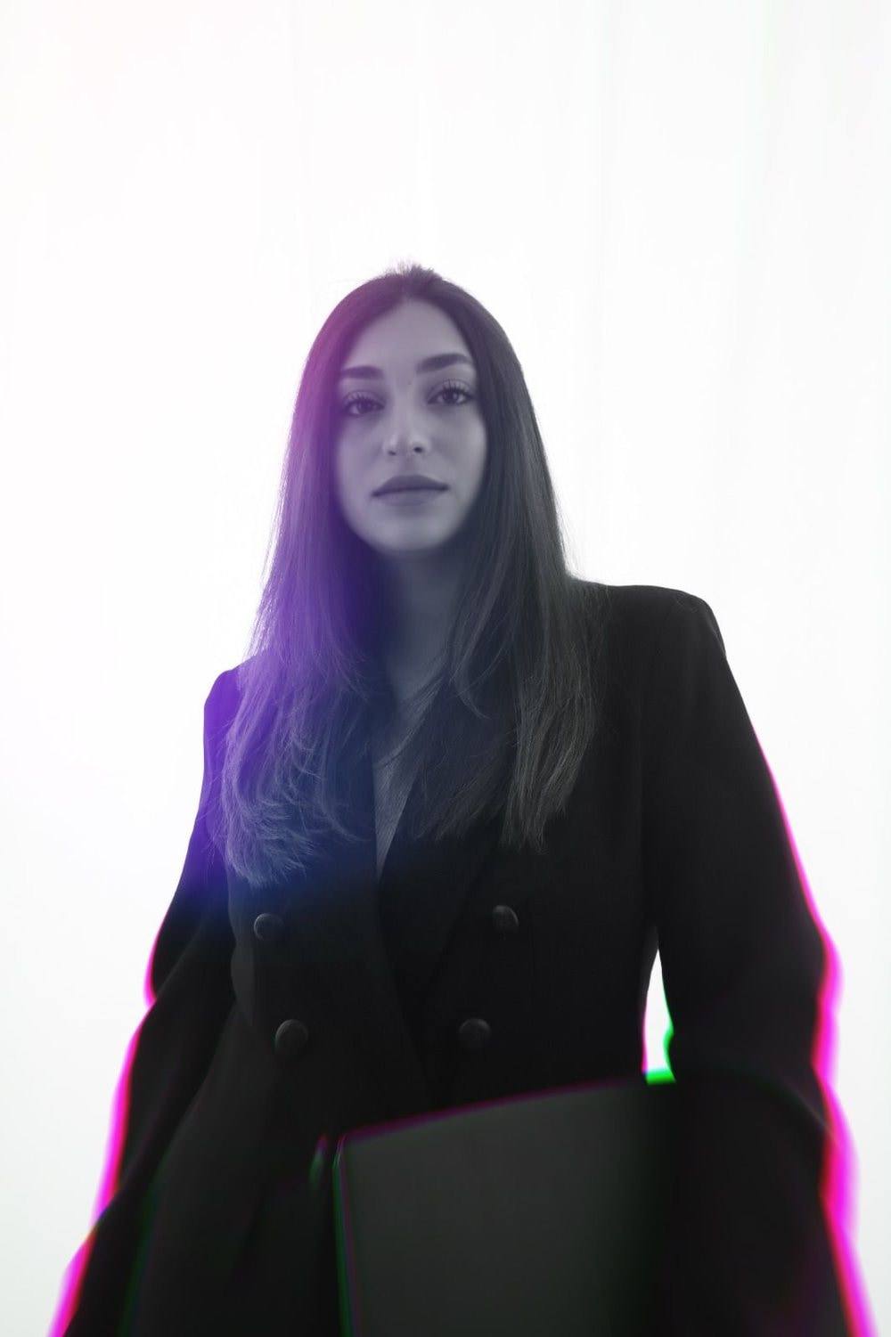 Studio portrait of Maayan in a black blazer